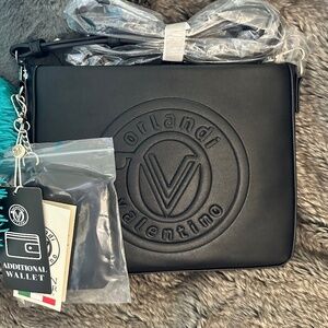 Valentino Orlandi medium size bag with logo on the front and wallet included